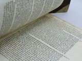 a close up of a book open on a table