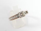 a picture of a diamond ring on a white background