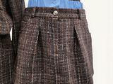 an image of a woman ' s skirt and jacket on a mannequin