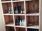 many bottles of alcohol on the shelves in the room
