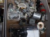 a box full of assorted electronics sitting on the floor