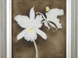 painting of a white flower with a yellow butterfly in a silver frame