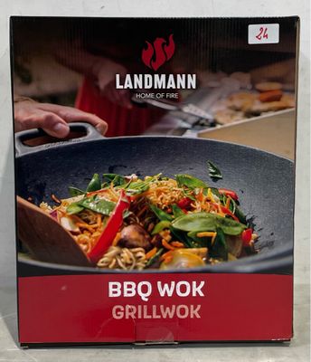 une boîte de « BBQ Wok » posée sur un plan de travail