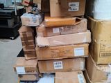 many boxes stacked on top of each other in a warehouse