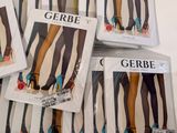 a lot of different types of women ' s tights on display