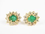 une paire de boucles d'oreilles en émeraude et diamant