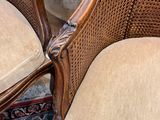 pair of antique cane back chairs in the style of louis xvi