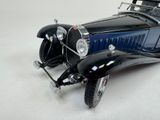 a model of a car that is sitting on a table