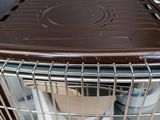 an image of a dishwasher with a basket on top