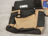 a tool bag that is sitting on the floor