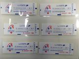 une photo montrant un ensemble d'autocollants sur un mur