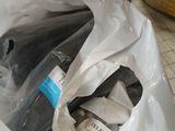 a bag full of items sitting on the floor