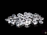 diamonds on a black surface with a black background