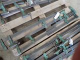 a pile of wooden pallets sitting on the ground
