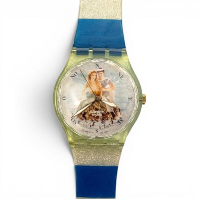 a watch that has a picture of a woman on it