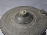 a close up of a metal object on a table