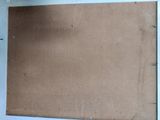 a picture of a piece of cardboard taped to a wall