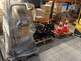 a large pile of boxes on a pallet in a warehouse