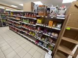 many shelves in the store that have various foods on them