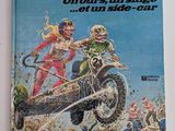 la couverture d'un magazine sur laquelle figure la photo d'une femme sur une moto tout-terrain
