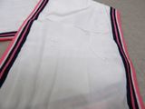 a white shirt with a red and blue stripe on it