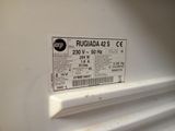 a label on the side of a refrigerator that is not in use