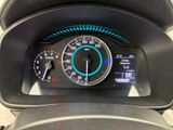 a close up of a car dashboard with a speedometer