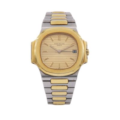 a close up of a watch on a white surface with a white background