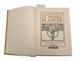 an open book with a picture of a tree on it