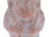 an image of a statue of a man with glasses on his head
