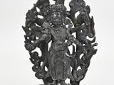 an image of a statue of a woman surrounded by animals