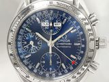 une image montrant un gros plan d'une montre-bracelet au cadran bleu
