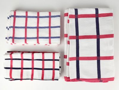 a set of three red, white and blue plaid napkins