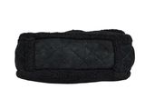 a close up of a black headband on a white background