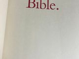 a white book with a red title on it