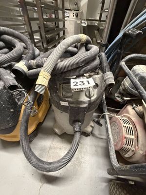 a lot of hoses that are sitting on the floor
