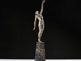 a bronze statue of a woman on a marble pedestal