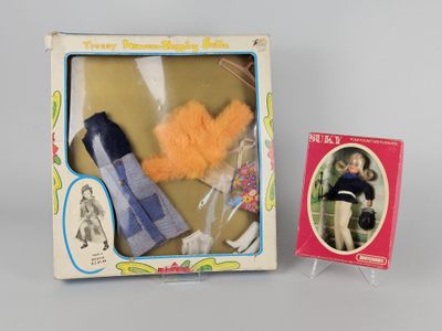 a doll in the box and a doll in the box