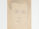 an image of a drawing of a man ' s face on a piece of paper