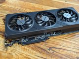 a close up of a video card on a wooden table