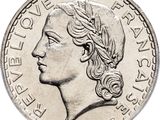 l'image d'une pièce d'argent sur laquelle figure le visage d'une femme