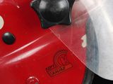 a close up of a helmet with a vise on it