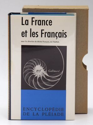 a book in a box sitting on top of a table