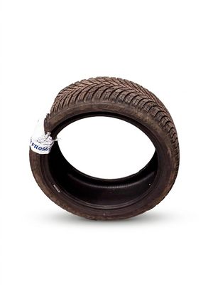 a close up of a tire on a white surface with a white background