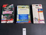 three nintendo wii games are sitting on a table next to each other