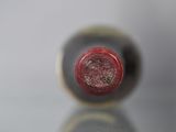a close up of a wine bottle on a table
