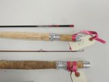 three different types of fishing rods with a pink ribbon tied to them