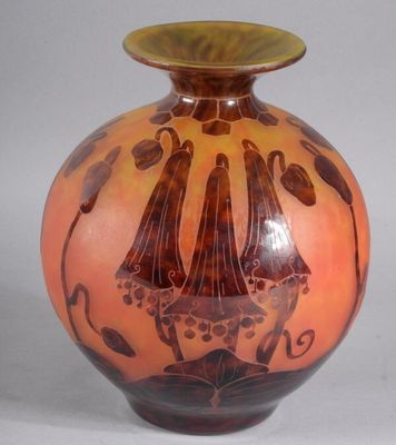a vase that is sitting on a white surface