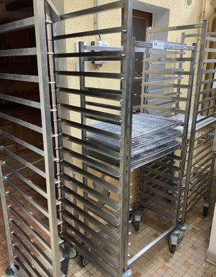 a metal rack with a tray of food on top of it