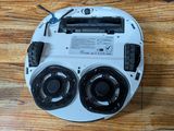 a radio that is sitting on top of a wooden table